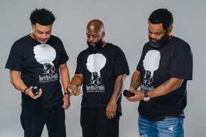3 men with Herbs & Oils T-shirts holding Herbs and Oils Hair Tonic, 2 men with Beards that use Herbs and Oils for beard maintenance