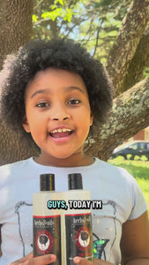 UGC of a kid who uses both the Naturally Bubbly Moisturizing Shampoo and the Top It Off Conditioner with completely moisturized hair.  moisturizing shampoo, sulfate free shampoo, natural shampoo for dry hair, shampoo for thinning hair, hydrating shampoo natural hair, buildup removal shampoo, gentle shampoo for sensitive scalp, shampoo for curly hair natural, healthy hair shampoo, shampoo for locs and braids